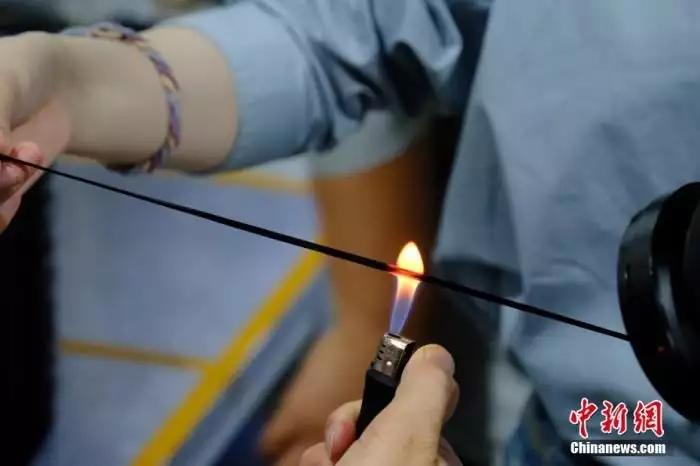 细如发丝却比钢强！中国强度摘下“材开云体育 开云平台料皇冠上的明珠”(图2)